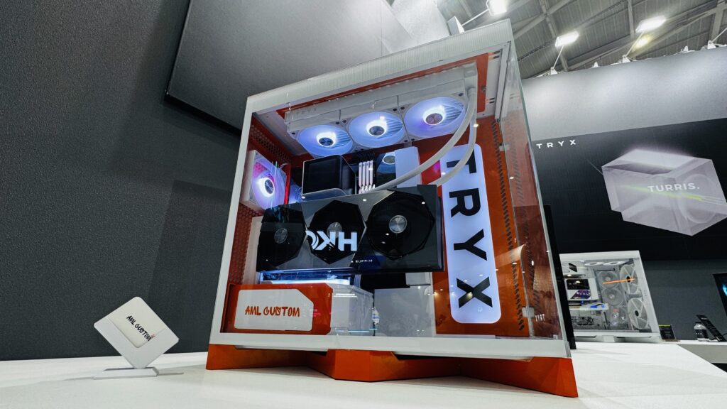 Orange and white AML Custom TRYX PC build displayed at Computex 2026